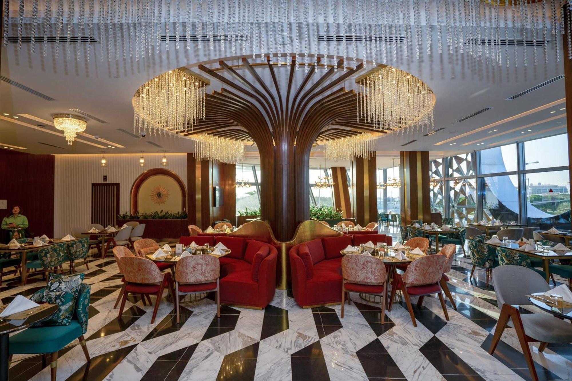Velero Hotel Doha Lusail Esterno foto The restaurant